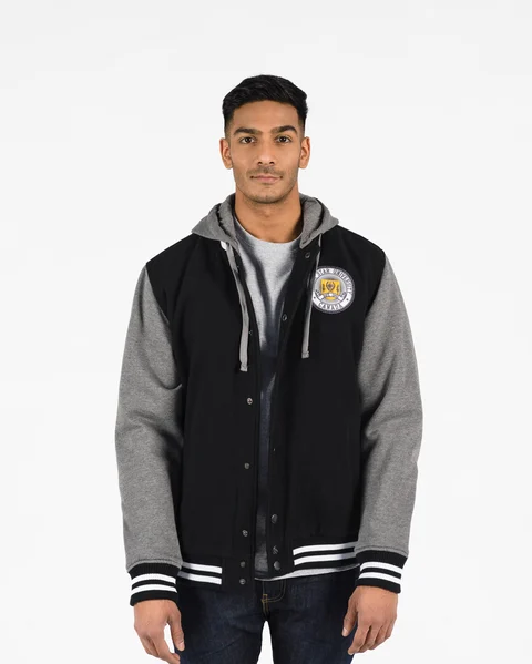 Insulated Letterman Jacket 518 Black with Charcoal sleeves on male model front view.