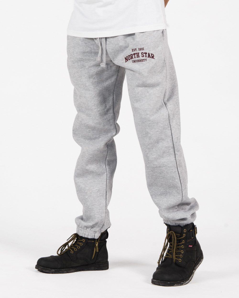 Premium Sweatpants 203 unisex fit in grey with burgundy embroidery on male model.